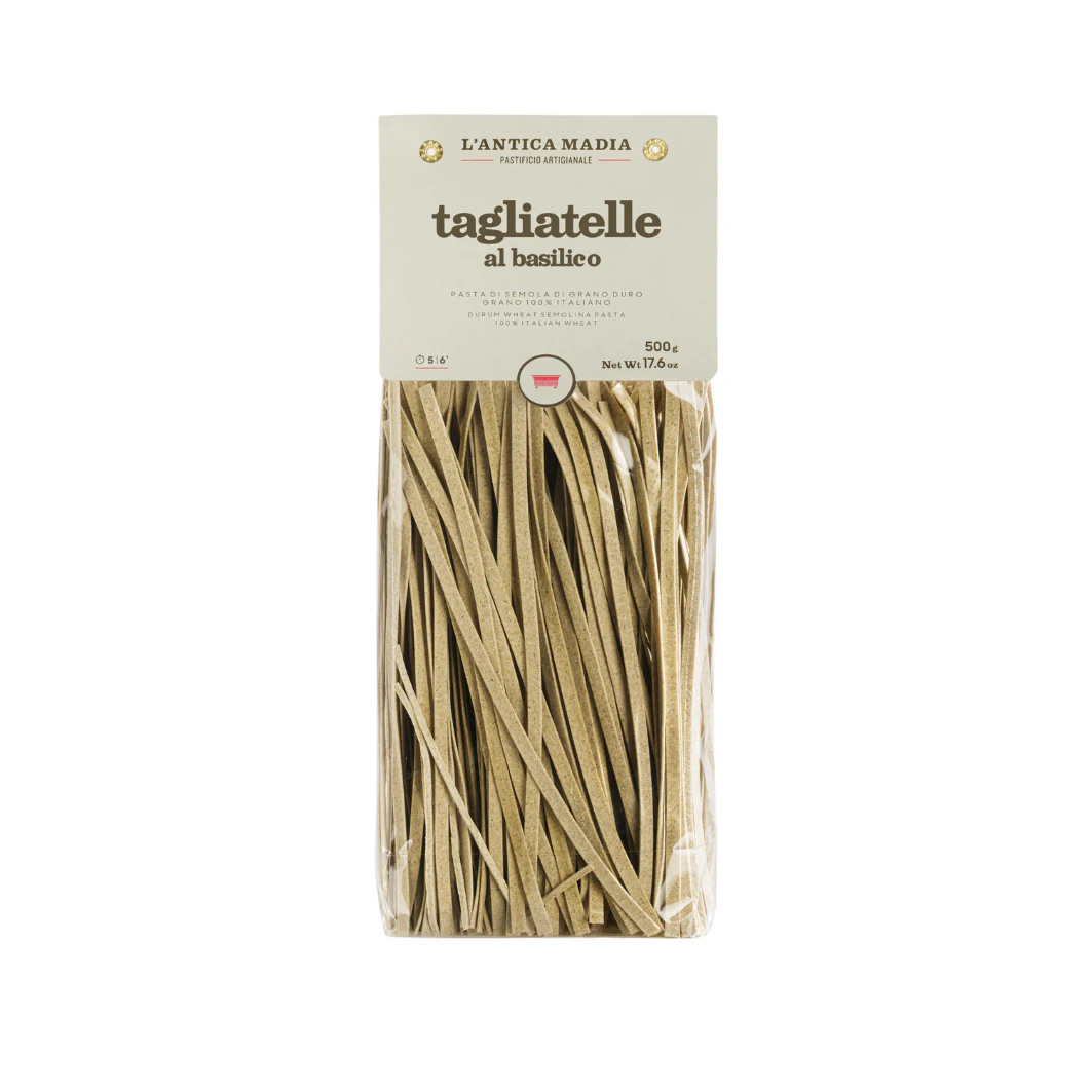 Tagliatelle al basilico dried ribbon pasta in sealed bag, beige-green