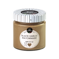 Black garlic mayonnaise jar with brown creamy spread and printed label