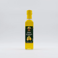 Lemon-infused extra virgin olive oil bottle with yellow cap and green label