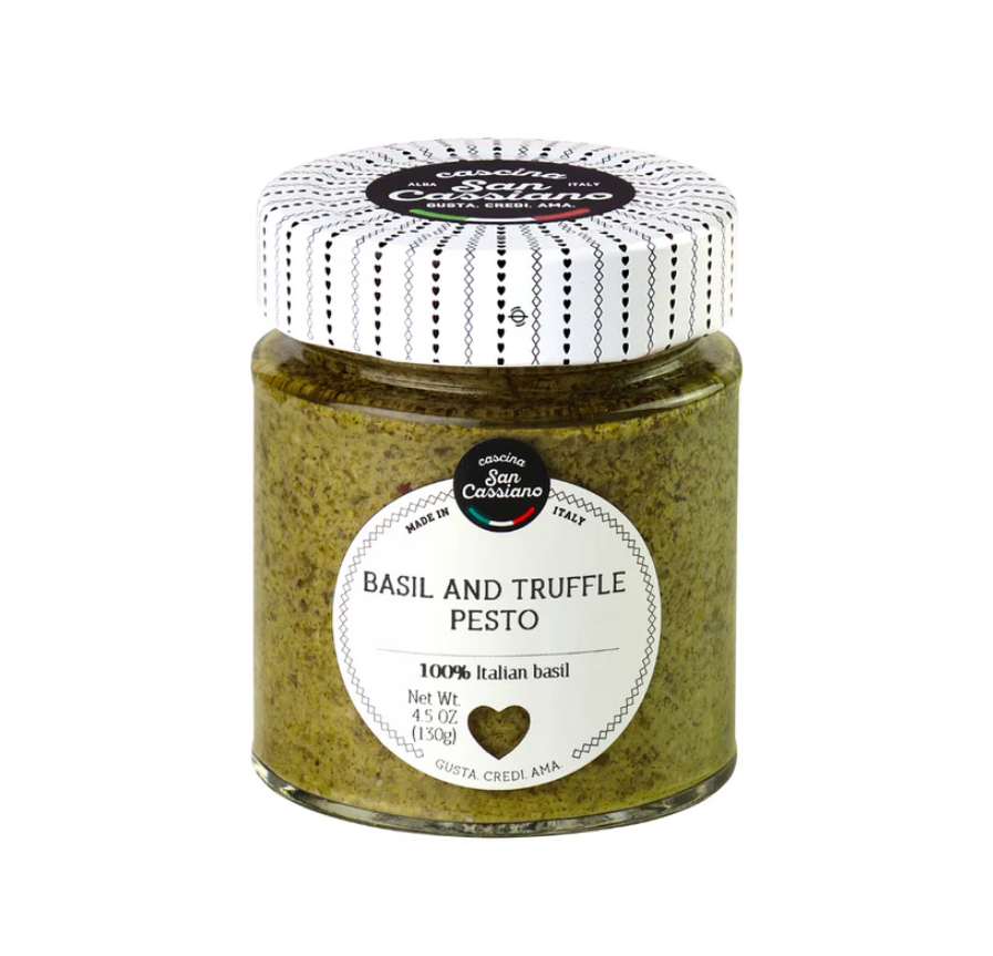 Glass jar of basil and black truffle pesto with label, 4.5 oz