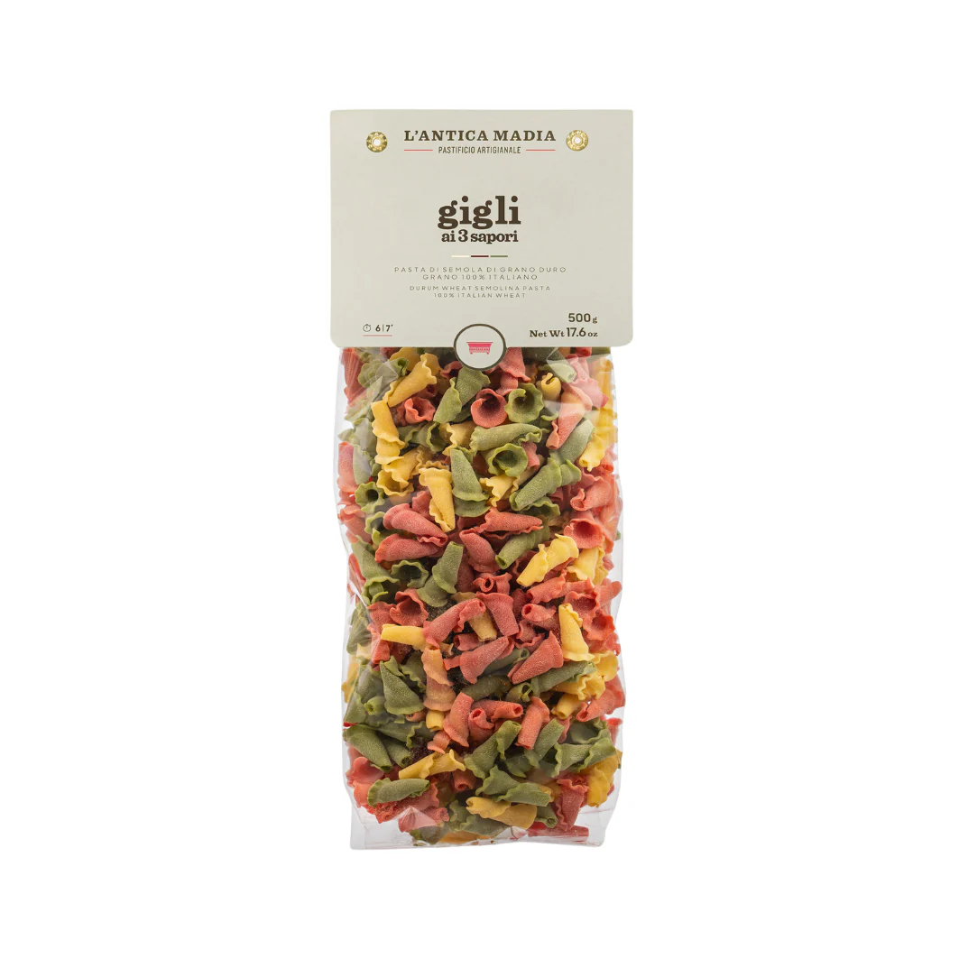 Antica madia gigli pasta, three-color dried pasta in sealed clear pouch.