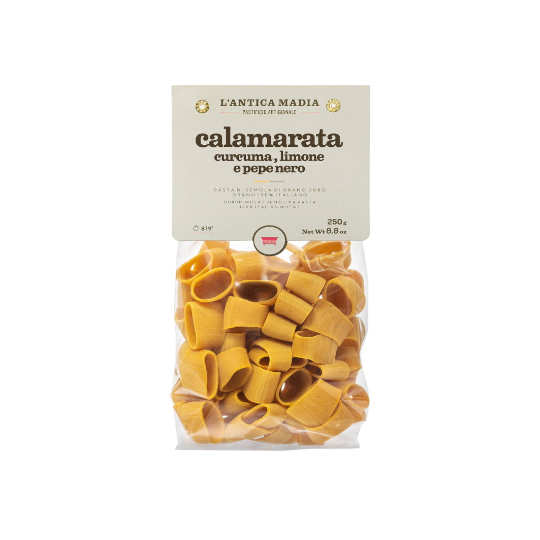 Calamarata pasta with turmeric, lemon & black pepper in sealed yellow pasta bag