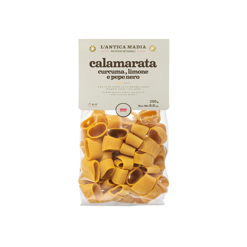 Calamarata pasta with turmeric, lemon & black pepper in sealed yellow pasta bag