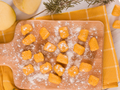 Sweet potato gnocchi on a wooden board, dusted with flour