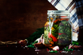 Grilled eggplant jar with herbs, peppers, and onion pieces